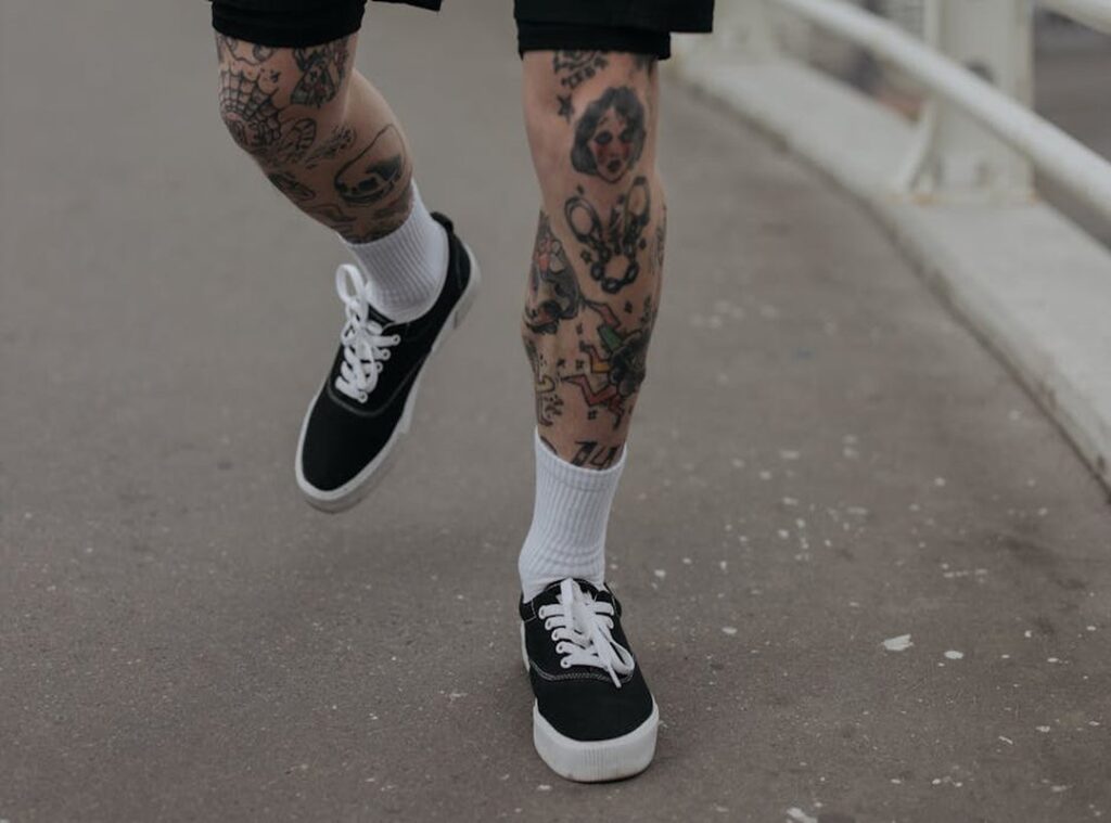 gangster chicano leg tattoos